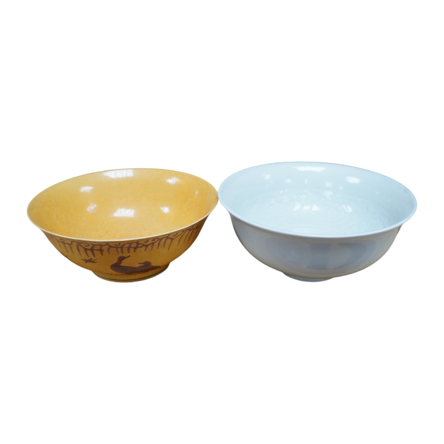 A Chinese celadon bowl and a fine yellow and brown decorated bowl, yellow bowl 9cm diameter. Condition - good